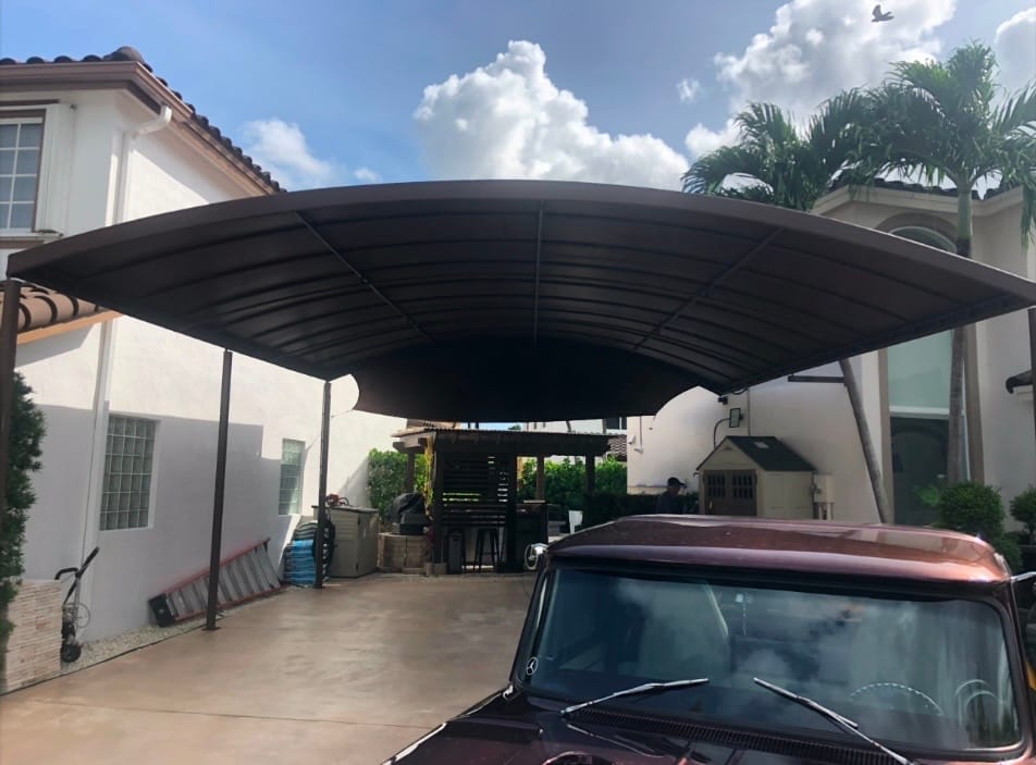 Residential blue window awning installed by EAB Awnings in South Florida